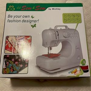 White lil sew & sew machine. Bought a couple years ago. Great for younger kids.